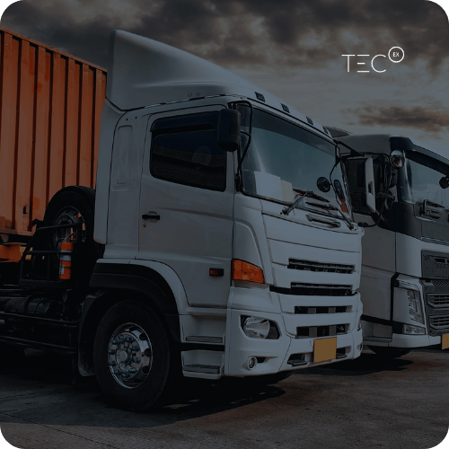 Two cargo trucks lined up to depict road freight